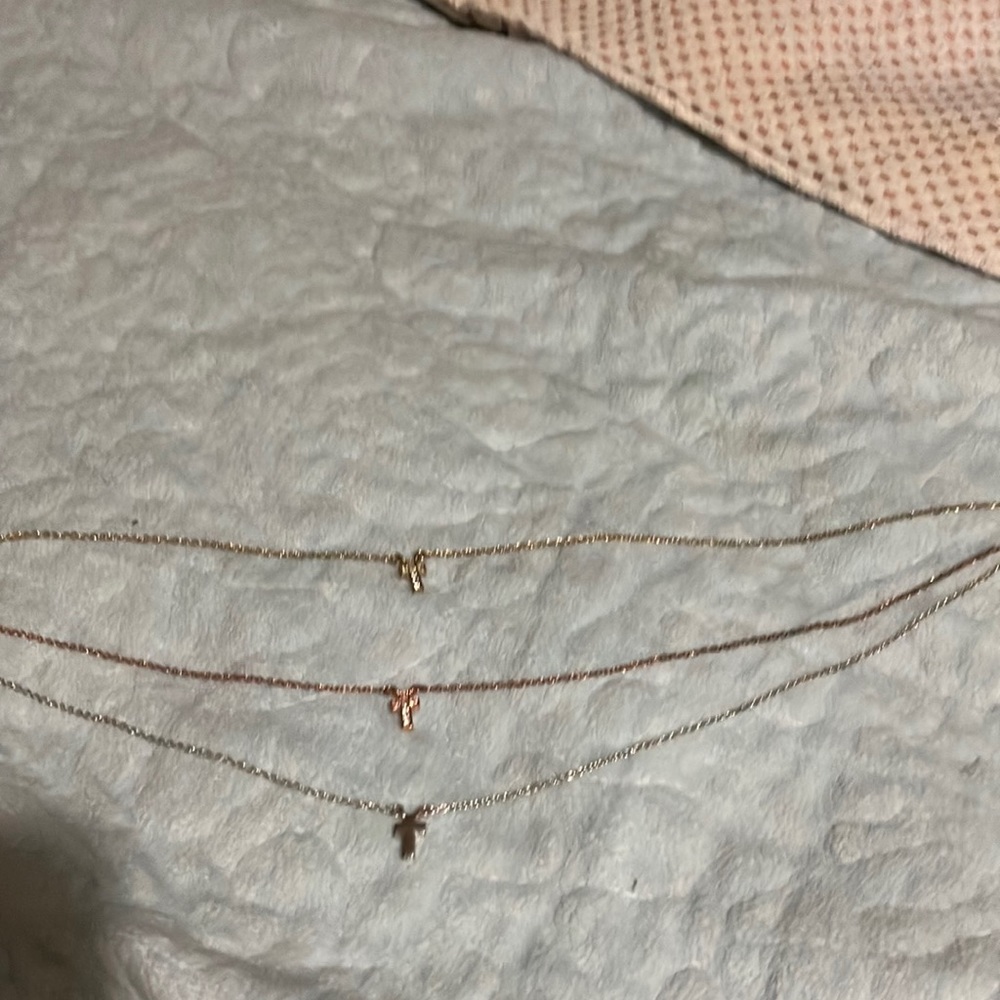 Three cross necklace, silver rose, gold, and gold